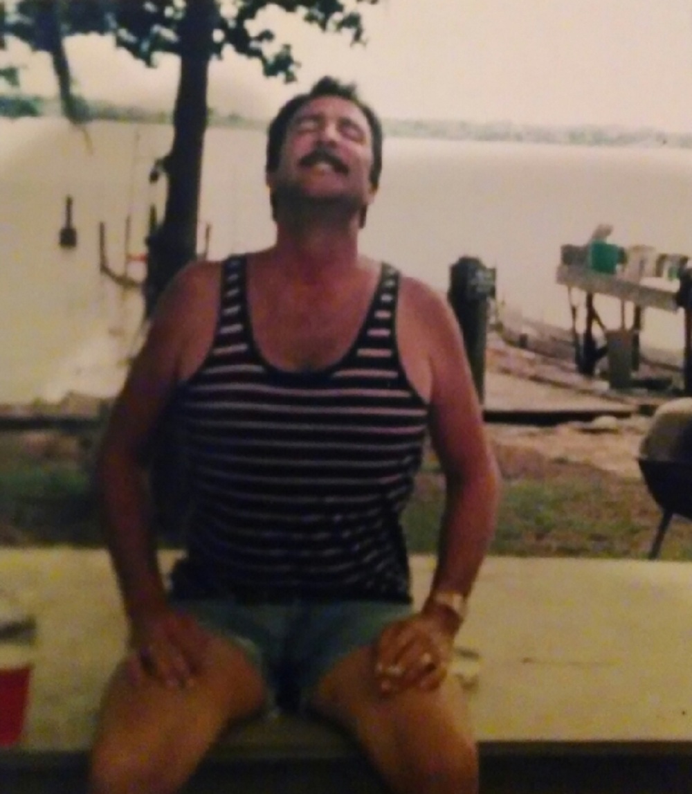 Dad leaning back at Lake Seminole House  Crop